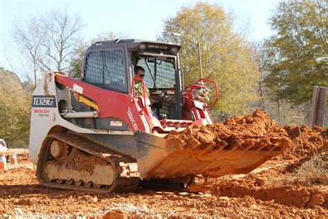 takeuchi tb130 skid steer track adjustment|takeuchi ctl track tension.